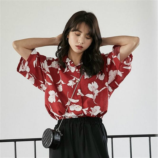 Shortsleeved Blouse With Floral Pattern